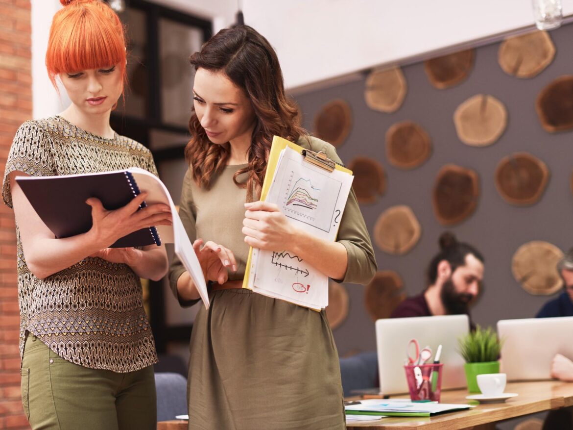 group-creative-people-analyzing-result-work